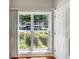 Bright window with blinds overlooking a well-maintained lawn and mature trees at 2031 Austin Park Cir, Decatur, GA 30032