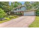 Charming two-story home featuring a two-car garage and a well-maintained front yard with attractive landscaping at 2146 Chevy Chase Ln, Decatur, GA 30032