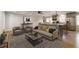 Open-concept living room and kitchen with modern appliances, neutral tones, and stylish decor at 2146 Chevy Chase Ln, Decatur, GA 30032