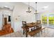 Cozy dining area featuring access to a deck through French doors, and views of the backyard at 220 Mountain Creek Rd, Bowdon, GA 30108