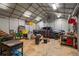 Wide angle view of the outbuilding with car parked and other tools at 220 Mountain Creek Rd, Bowdon, GA 30108