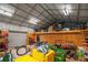 View inside the outbuilding with tools and other items at 220 Mountain Creek Rd, Bowdon, GA 30108