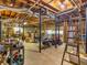 Spacious unfinished basement with high ceilings, exposed duct work, and supporting columns offers room to grow at 3500 Lost Valley Dr, Jonesboro, GA 30236
