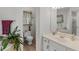 Bright bathroom showcasing a white vanity, a toilet, and a luxurious soaking tub at 3500 Lost Valley Dr, Jonesboro, GA 30236
