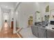 Bright living room features fireplace, large windows, and views to the kitchen at 3500 Lost Valley Dr, Jonesboro, GA 30236