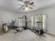Spacious workout room featuring multiple machines, light gray carpet, and natural light at 3500 Lost Valley Dr, Jonesboro, GA 30236