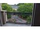 View from balcony overlooking flowering trees, walkway and residential buildings at 840 United Se Ave # 408, Atlanta, GA 30312