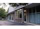 Building's facade featuring stone accents, large windows, and an awning, combining natural materials with modern design at 840 United Se Ave # 408, Atlanta, GA 30312