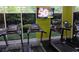 Modern gym area featuring updated treadmills, workout equipment, and a wall mounted TV for convenience at 840 United Se Ave # 408, Atlanta, GA 30312