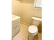 A well-lit bathroom features a toilet and sink at 1028 Gate Post Ln, Lawrenceville, GA 30044