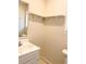 A well-lit bathroom features a vanity and toilet at 1028 Gate Post Ln, Lawrenceville, GA 30044