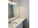 A well-lit bathroom features a marble countertop at 1028 Gate Post Ln, Lawrenceville, GA 30044