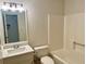A well-lit bathroom features a tub and marble countertop at 1028 Gate Post Ln, Lawrenceville, GA 30044
