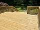 A wooden deck shows off the home's outdoor living space, perfect for entertaining or relaxing at 1028 Gate Post Ln, Lawrenceville, GA 30044