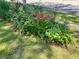 Landscaping with lush flowerbeds along the fence line at 1028 Gate Post Ln, Lawrenceville, GA 30044