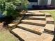 Exterior shot of stone steps leading to the home at 1028 Gate Post Ln, Lawrenceville, GA 30044