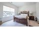 Well-lit bedroom with comfortable bedding and neutral decor. Natural light coming in from the window at 3518 Mount Blue Ave, Tucker, GA 30084