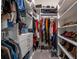 Spacious walk-in closet featuring custom shelving, drawers, and ample storage for clothes and shoes at 3518 Mount Blue Ave, Tucker, GA 30084