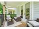 Relaxing outdoor deck with comfortable seating area and wooded views at 3518 Mount Blue Ave, Tucker, GA 30084