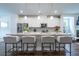 Modern kitchen featuring granite counters, stainless appliances, and breakfast bar at 3518 Mount Blue Ave, Tucker, GA 30084