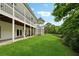 Expansive backyard featuring lush green lawn, a covered patio, and a charming gazebo at 471 Henderson Lake Dr, Canton, GA 30115