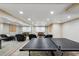 Finished basement provides entertainment space with a ping pong table and media viewing area at 471 Henderson Lake Dr, Canton, GA 30115