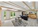 Basement with tile floors, a set of french doors to the yard, and a drum set with computers and seating at 471 Henderson Lake Dr, Canton, GA 30115