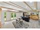 Finished basement with tile flooring, recessed lighting, and access to the backyard at 471 Henderson Lake Dr, Canton, GA 30115