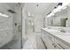Bright bathroom features double vanity, marble floors, and a spacious glass shower at 471 Henderson Lake Dr, Canton, GA 30115