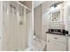 Simple bathroom with a shower, vanity, and tile flooring at 471 Henderson Lake Dr, Canton, GA 30115