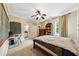 Neutral bedroom featuring a desk and chalkboard next to the bed, with access to the bathroom, creating a functional space at 471 Henderson Lake Dr, Canton, GA 30115