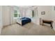 Bedroom with carpet, two windows, closet, and furniture at 471 Henderson Lake Dr, Canton, GA 30115