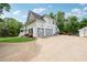 Charming two-story home with a three-car garage and a welcoming front porch at 471 Henderson Lake Dr, Canton, GA 30115