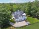 Rear exterior of the home with lush backyard and well-maintained landscaping at 471 Henderson Lake Dr, Canton, GA 30115