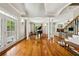 Open foyer with hardwood floors, a grand piano, and an open floor plan at 471 Henderson Lake Dr, Canton, GA 30115