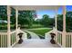 Welcoming front porch with ornate planters and a view of the landscaped front yard at 471 Henderson Lake Dr, Canton, GA 30115