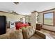 A well-lit living room with an eating area and an exterior view at 471 Henderson Lake Dr, Canton, GA 30115