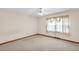 Bedroom featuring neutral paint, a ceiling fan, and carpet at 4911 Old Douglasville Rd, Lithia Springs, GA 30122
