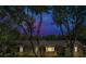 Charming brick home with large windows and mature trees at 4911 Old Douglasville Rd, Lithia Springs, GA 30122