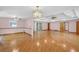 Generous living space showcasing hardwood floors, tray ceilings, and ample natural light at 4911 Old Douglasville Rd, Lithia Springs, GA 30122