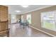 Cozy sunroom with tile floors, a table with chairs, and large windows offering natural light at 4911 Old Douglasville Rd, Lithia Springs, GA 30122