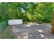 Spacious backyard featuring mature landscaping, a shed, and an inviting covered bench at 5 Windsor Ter, Avondale Estates, GA 30002