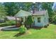 Beautiful home exterior with a well-maintained lawn and tasteful landscaping at 5 Windsor Ter, Avondale Estates, GA 30002