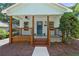 Delightful front porch with wooden accents, offering a cozy entrance to the home at 5 Windsor Ter, Avondale Estates, GA 30002