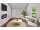 Cozy living room offers a modern fireplace and bright natural light at 5 Windsor Ter, Avondale Estates, GA 30002