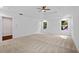 Spacious bedroom featuring large windows and neutral carpeting for a comfortable retreat at 5 Windsor Ter, Avondale Estates, GA 30002
