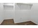 Spacious walk-in closet with ample shelving and neutral carpeting at 5 Windsor Ter, Avondale Estates, GA 30002