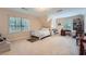 Cozy bedroom featuring neutral paint, shuttered windows, and carpet floors at 8470 Valemont Dr, Atlanta, GA 30350