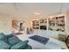 Cozy living room with built-in bookshelves, plush seating, and staircase access at 8470 Valemont Dr, Atlanta, GA 30350