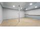 Unfinished basement ready for renovation with high ceilings and a concrete floor at 143 Frances Dr, Dallas, GA 30157